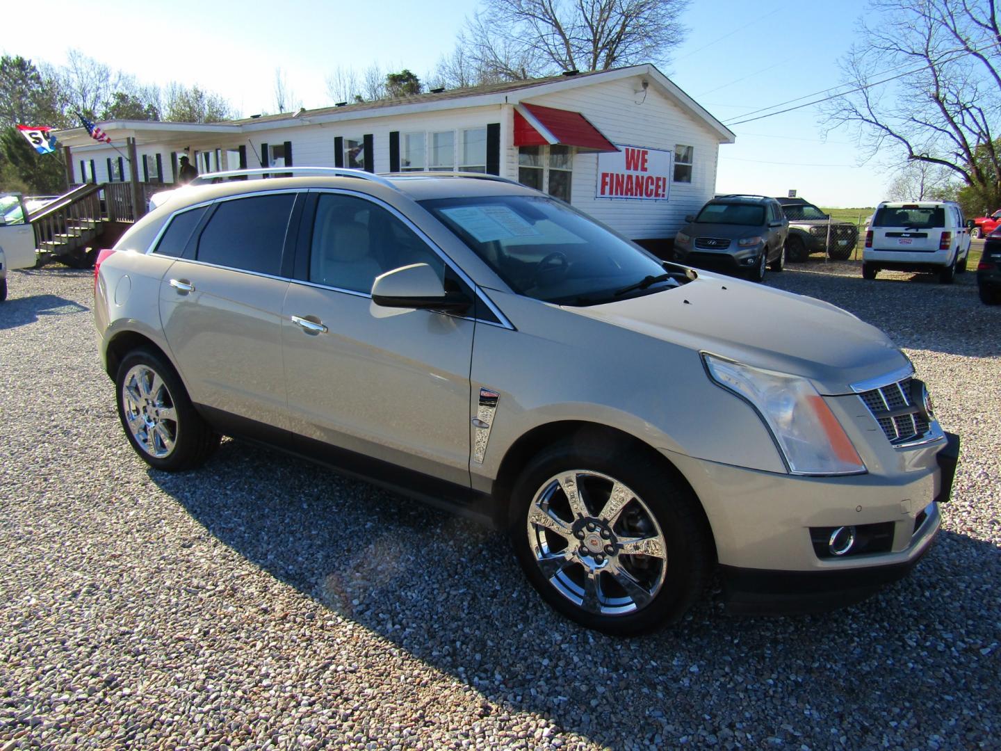 2012 Gold Cadillac SRX Premium (3GYFNCE36CS) with an 3.6L V6 DOHC 24V FFV engine, Automatic transmission, located at 15016 S Hwy 231, Midland City, AL, 36350, (334) 983-3001, 31.306210, -85.495277 - Photo#0